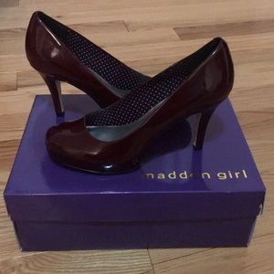 Never been worn wine colored patent pumps